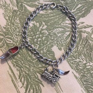 Vintage sterling silver bracelet with two charms